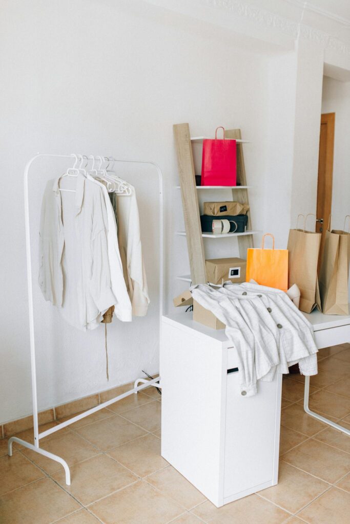 White Textile on White Wooden Table